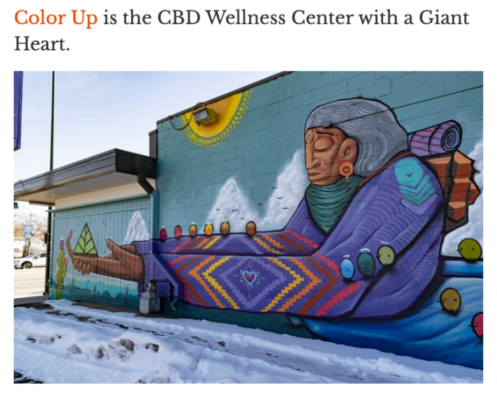Mural of a person in a purple outfit with geometric patterns on the side of color up wellness center at 2191 south broadway in Denver, CO which has since moved.