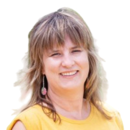 Woman with shoulder-length hair wearing a yellow top outdoors