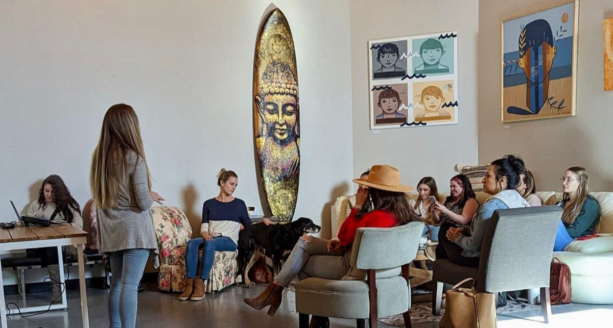 Group of people being educated at the color up wellness center