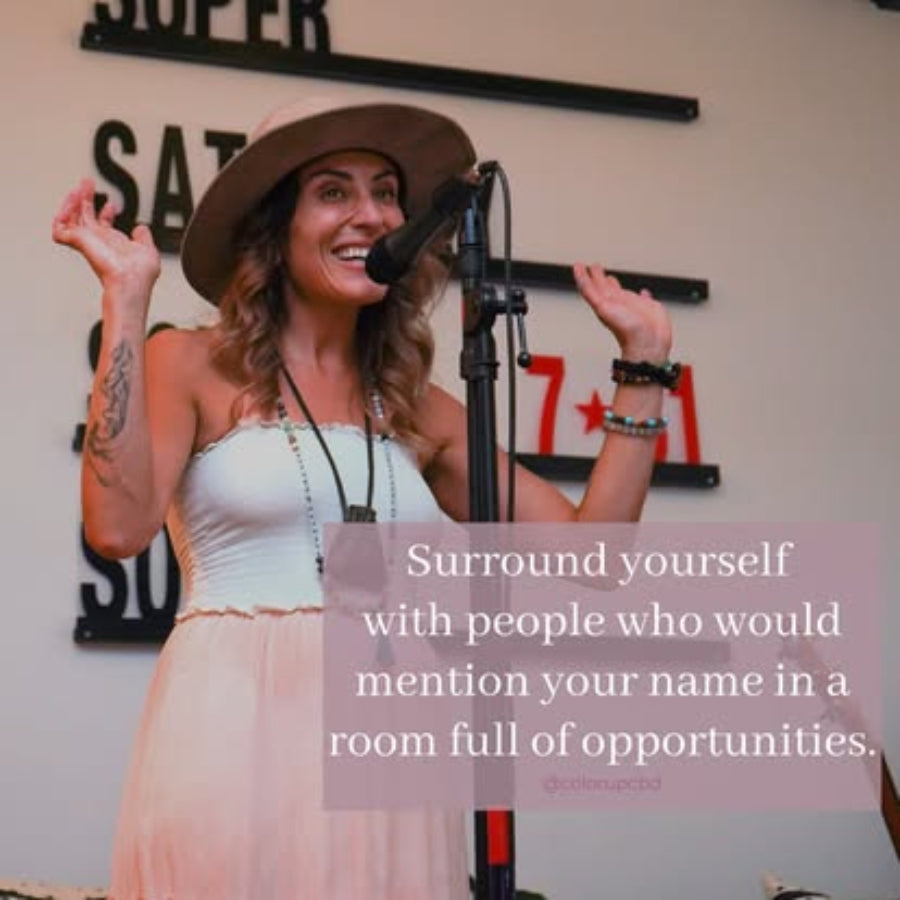 Shauna Blanch speaking into a microphone