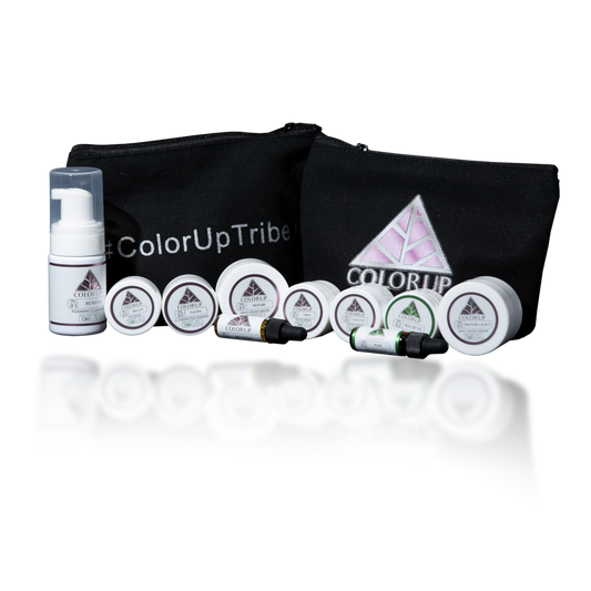 Color Up Tribe blag canvas bag with 10 white sample sized skin care products labeled with Color Up green and pink triangle logos. 
