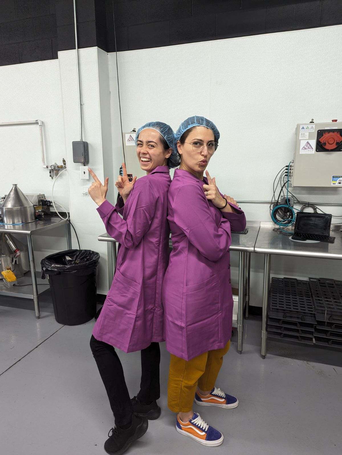 Amber White-Benzel and a colleague in the Color Up lab