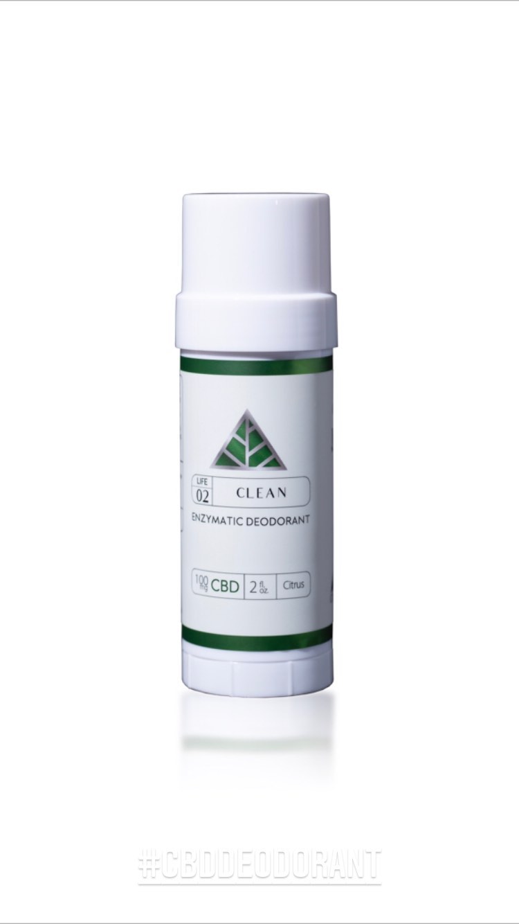 Deodorant stick with a green and white design on a white background