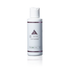 White squeeze bottle with 'Detox Clay Masque' label with pink Color Up triangle