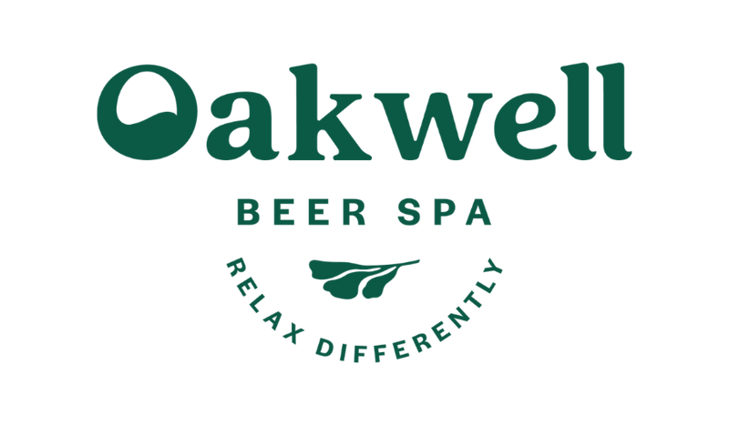 Oakwell Beer Spa logo with green text on a white background