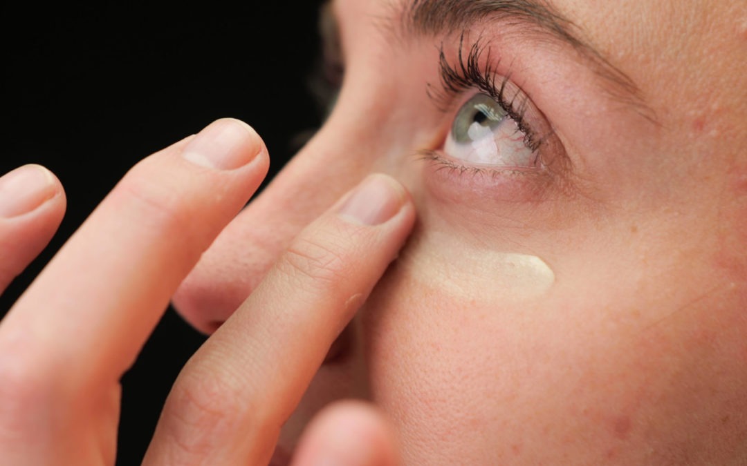 woman applying eye cream from best cbd beauty products line from Color Up